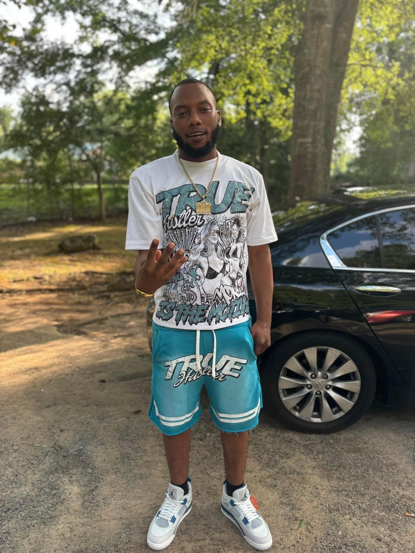 Hillside “Money Is The Motive” Graphic Tee – Light Blue